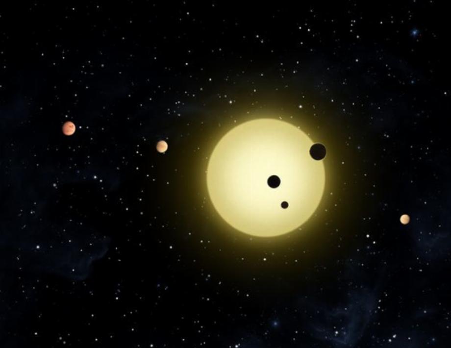 Vue d'artiste de Kepler-11, une petite étoile froide autour de laquelle orbitent six planètes. (photo : NASA/Tim Pyle