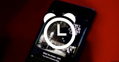 Comment programmer le téléphone portable pour mettre la musique en pause si j'écoute Spotify ou Apple Music et que je m'endors