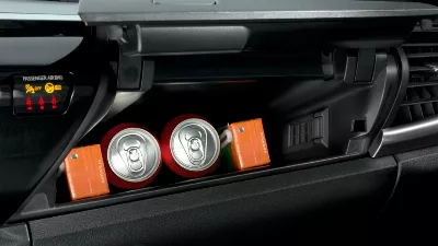 Quel est le bouton secret de la voiture dans la boîte à gants qui réduit immédiatement la chaleur ?
