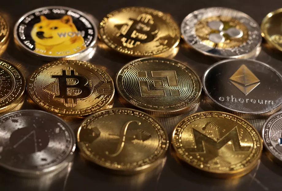 Représentations de diverses crypto-monnaies. (Reuters/Dado Ruvic/Illustration)